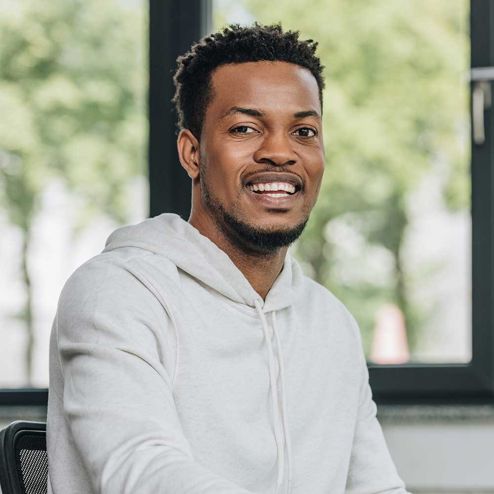 cheerful-african-american-programmer-looking-at-ca-VPSTAKR-1.jpg cheerful-african-american-programmer-looking-at-ca-VPSTAKR-1.jpg